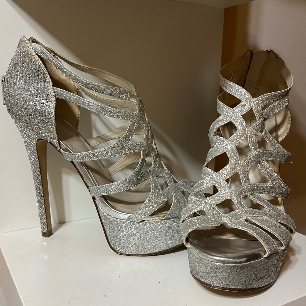 Shiny silver platform heels